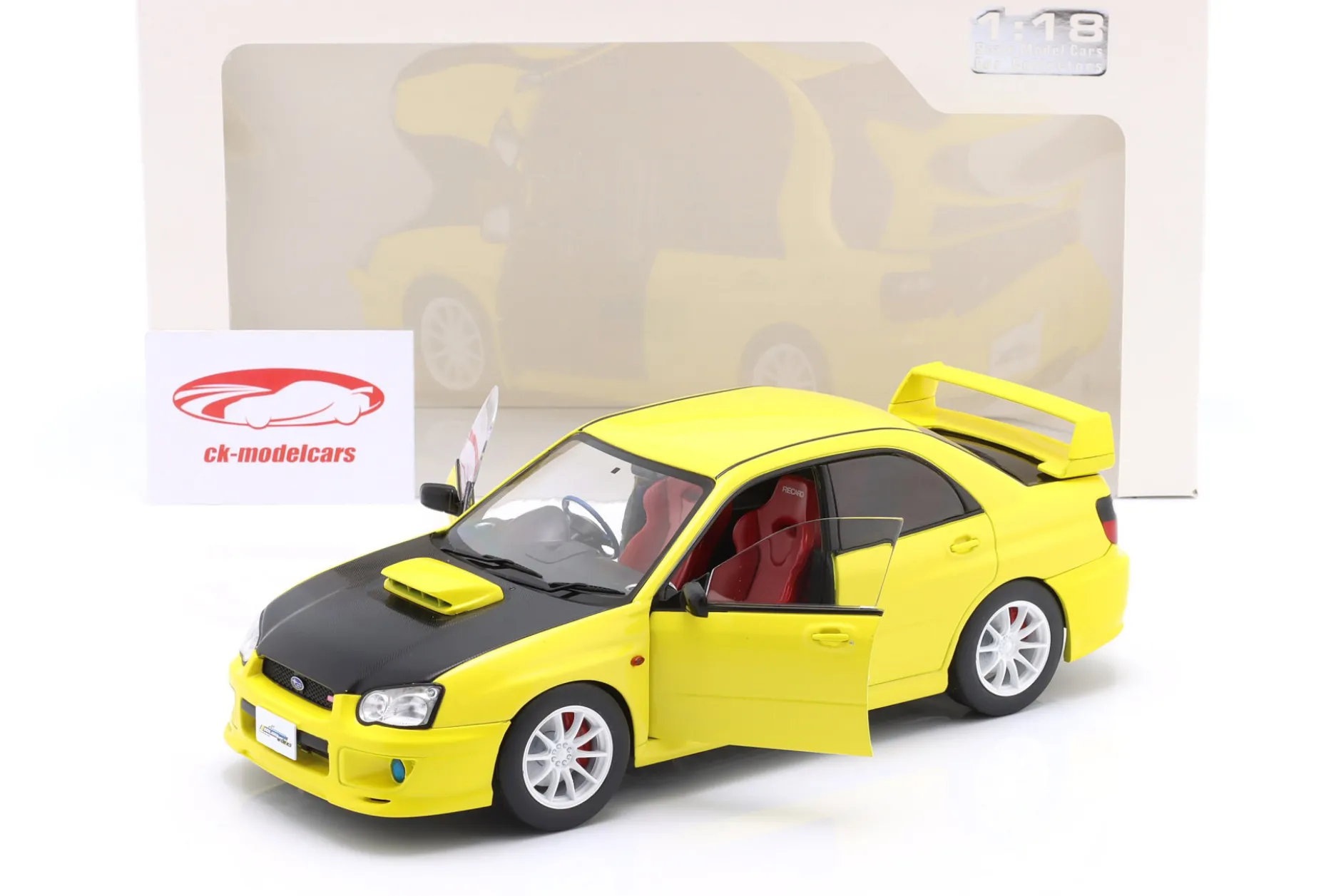 Subaru Impreza WRX STI Baujahr 2003 gelb / schwarz 1:18 Solido