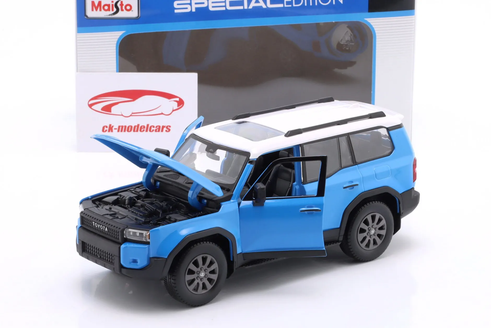 Toyota Land Cruiser Baujahr 2024 blau / weiß 1:24 Maisto