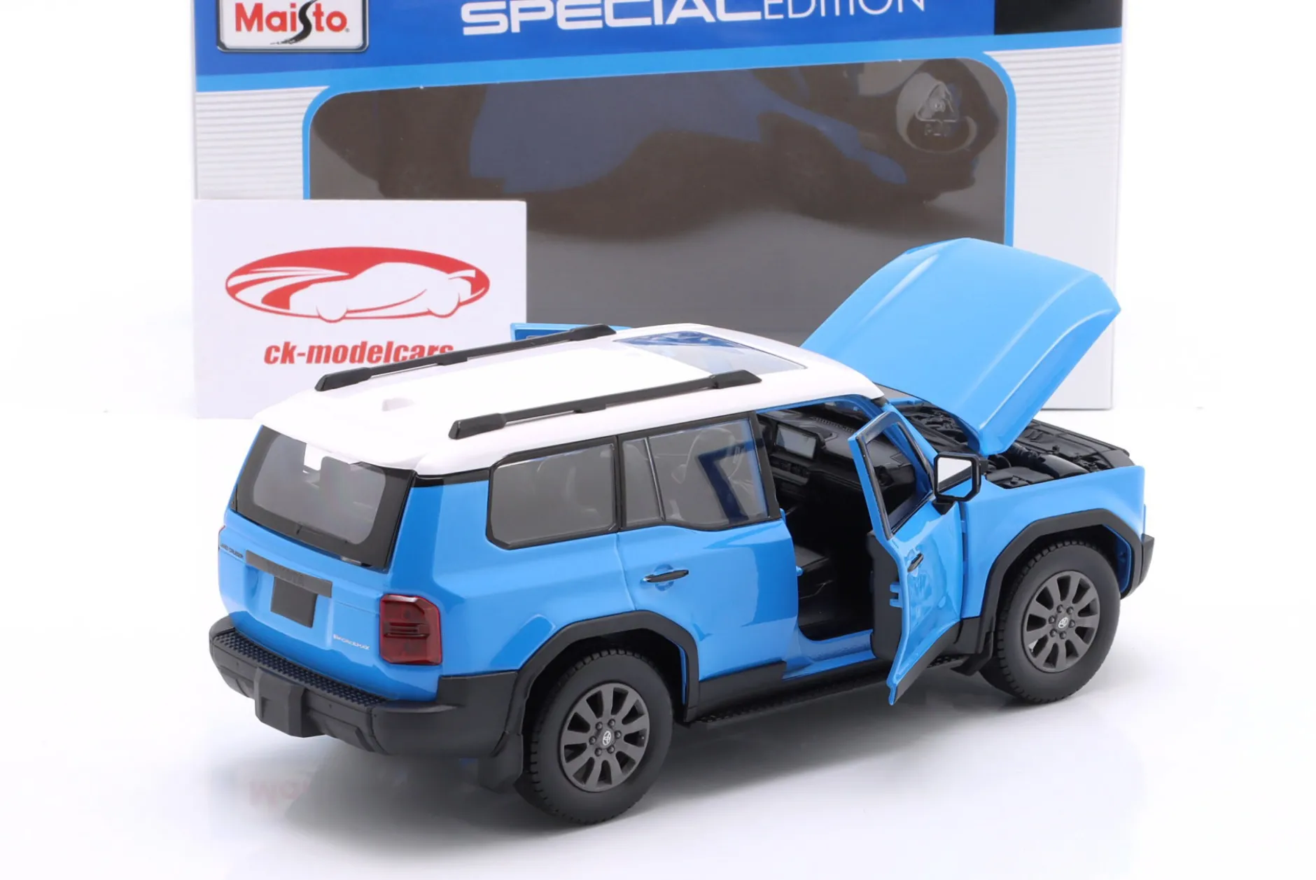 Toyota Land Cruiser Baujahr 2024 blau / weiß 1:24 Maisto